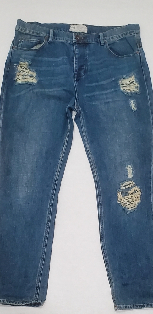 Free people distressed blue jeans